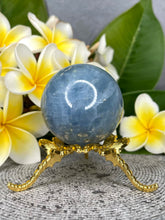Load image into Gallery viewer, Calming Blue Calcite Crystal Sphere
