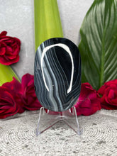 Load image into Gallery viewer, Striking Black Agate Crystal Palmstone Carving