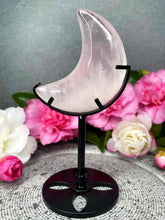 Load image into Gallery viewer, Soft Rose Quartz Crystal Crescent Moon Carving Black Stand
