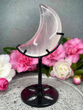 Load image into Gallery viewer, Transparent Rose Quartz Crystal Crescent Moon Carving On Black Stand
