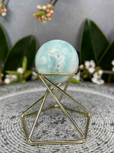 Load image into Gallery viewer, Calming Blue Aragonite Crystal Sphere Carving
