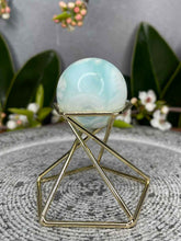 Load image into Gallery viewer, Calming Blue Aragonite Crystal Sphere Carving
