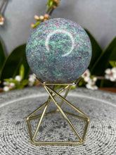 Load image into Gallery viewer, Stunning UV Reactive Ruby Fuchsite Kyanite Crystal Sphere
