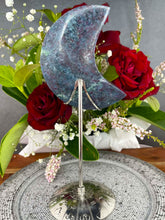 Load image into Gallery viewer, Kyanite Fuchsite Ruby Crescent Moon On Silver Zodiac Stand
