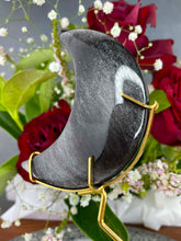 Load image into Gallery viewer, Silver Sheen Obsidian Crescent Moon On Gold Stand
