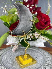Load image into Gallery viewer, Stunning Silver Sheen Obsidian Crescent Moon On Gold Stand
