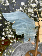 Load image into Gallery viewer, Clear Blue Onyx Crystal Butterfly Wings On Gold Stand
