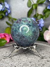 Load image into Gallery viewer, Stunning UV Reactive Ruby Kyanite Fuchsite Crystal Sphere
