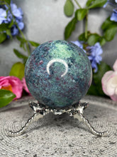Load image into Gallery viewer, Stunning UV Reactive Ruby Kyanite Fuchsite Crystal Sphere
