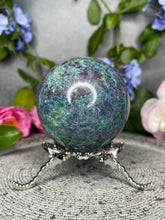 Load image into Gallery viewer, Stunning UV Reactive Ruby Kyanite Fuchsite Crystal Sphere

