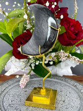 Load image into Gallery viewer, Silver Sheen Obsidian Crescent Moon On Gold Stand
