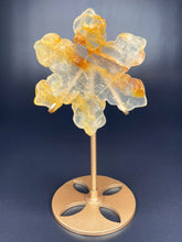 Load image into Gallery viewer, Golden Healer Snowflake Crystal Carving On Gold Stand
