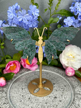 Load image into Gallery viewer, UV Ruby Kyanite Fuchsite Crystal Butterfly Wings On Gold Stand
