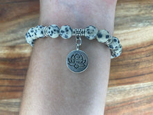 Load image into Gallery viewer, Dalmatian Jasper Crystal Bracelet With Lotus Charm
